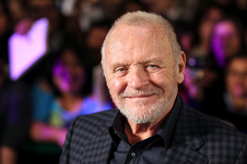FILE - In this Feb. 15, 2011 file photo, Anthony Hopkins smiles while posing for photos prior to the premiere of his new film "The Rite" in Mexico City.  â€œNomadlandâ€ has won four prizes, including best picture, at the British Academy Film Awards on Sunday, April 11, 2021. The filmâ€™s director, Chloe Zhao, became only the second woman to win the best director trophy, and star Frances McDormand was named best actress. â€œNomadlandâ€ also took the cinematography prize on Sunday. Emerald Fennellâ€™s revenge comedy â€œPromising Young Womanâ€ was named best British film, while the best actor trophy went to 83-year-old Anthony Hopkins for playing a man grappling with dementia in â€œThe Father.â€ An event that was criticized in the recent past with the label #BAFTAsSoWhite rewarded a diverse group of talents, during a pandemic-curbed ceremony at Londonâ€™s Royal Albert Hall. (AP Photo/Alexandre Meneghini, File)