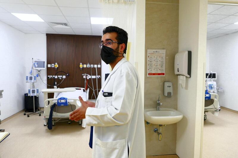 Doctor Mohammad Nour Al Saeed showing the SEHA ICU Center at Dubai Parks and Resorts in Dubai on April 26,2021. (Pawan Singh/The National). Story by Nick Webster