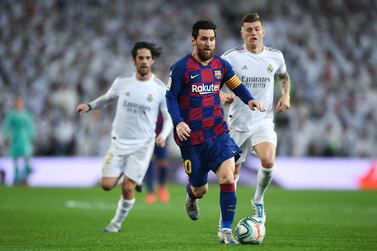 MADRID, SPAIN - MARCH 01: Lionel Messi of FC Barcelona runs with the ball during the Liga match between Real Madrid CF and FC Barcelona at Estadio Santiago Bernabeu on March 01, 2020 in Madrid, Spain. (Photo by David Ramos/Getty Images)