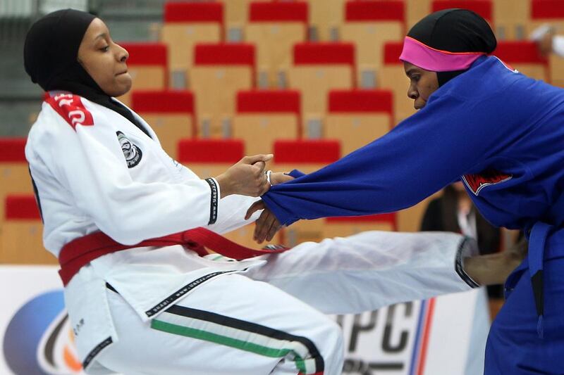 Samya Al Balooshi (left) and Mooza Mohammed Al Ali during their match. Delores Johnson / The National