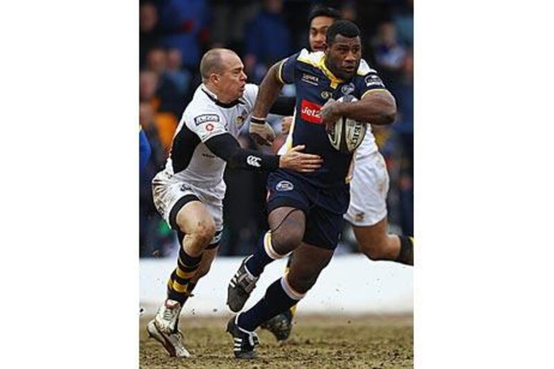 Seru Rabeni, with ball, is tackled by Mark Van Gisbergen during the  match between Leeds and Wasps yesterday.