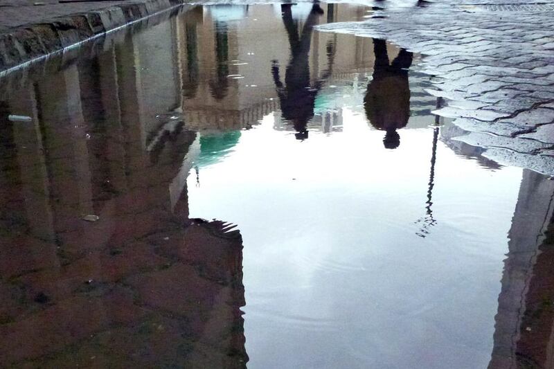 April showers left the streets of Abu Dhabi slick throughout the day. Abu Dhabi residents woke up to a wet morning on Friday as rain sprinkled across the emirate. Delores Johnson / The National