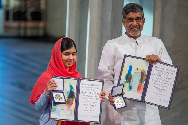 2014. Malala Yousafzai and Kailash Satyarthi accept their Nobel Peace Prize Awards 'for their struggle against the suppression of children and young people and for the right of all children to education'. Getty Images