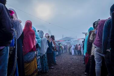 Ethiopians queue in the early morning to cast their votes in the general election, in Prime Minister Abiy Ahmed’s home town of Beshasha. AP