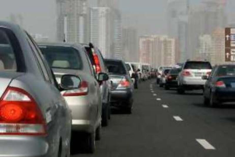 DUBAI, UNITED ARAB EMIRATES- Sep 9:  Traffic chaos in the morning near the Greens, Dubai. ( Pawan Singh / The National ) *** Local Caption ***  PS003- TRAFFIC.jpgPS003- TRAFFIC.jpg