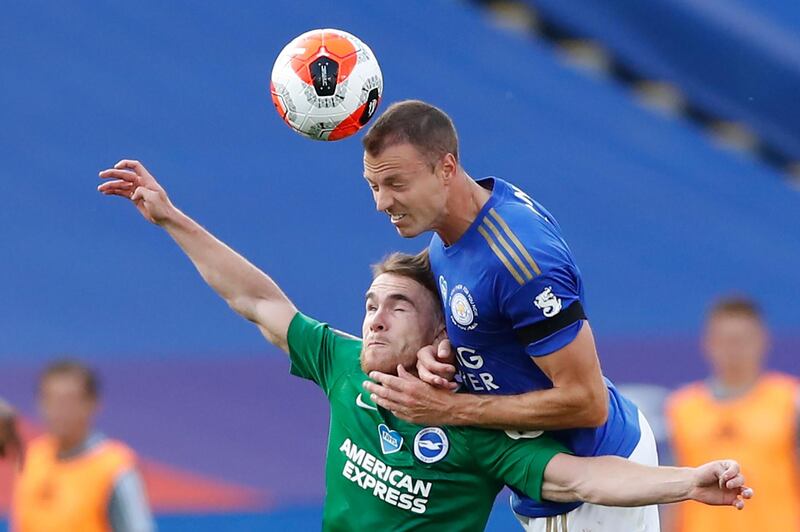 Brighton striker Aaron Connolly vies for the ball with Leicester City's Jonny Evans. AFP