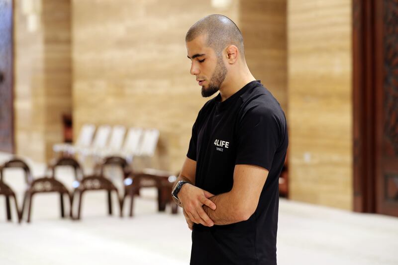 UFC fighter Muhammad Mokaev prays at Al Fateh Grand Mosque in Manama, Bahrain. 