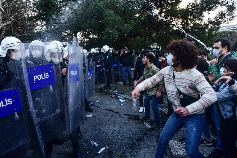 Police in riot gear clash with students of Bogazici University, in Istanbul. AP Photo