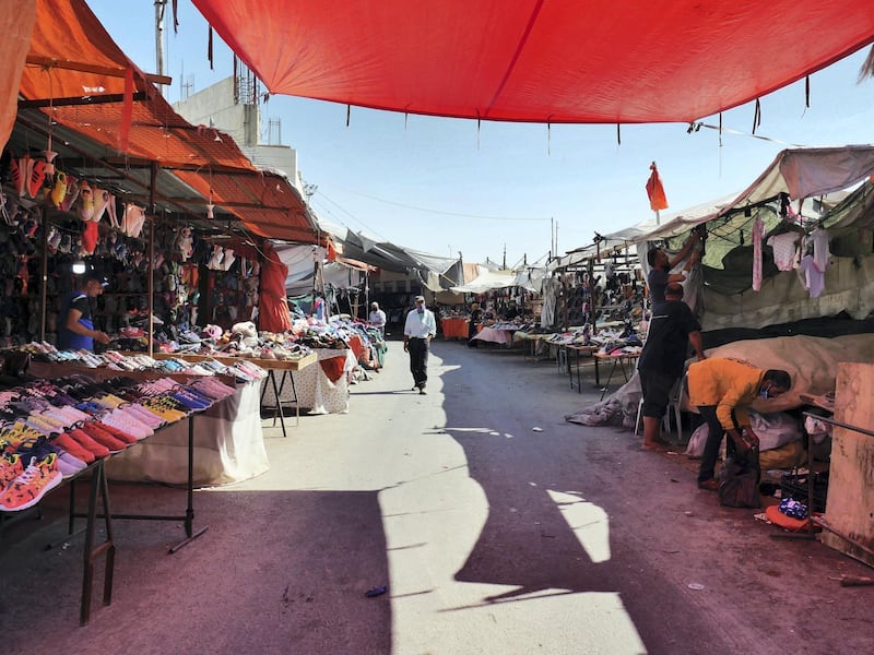 Pictured: The street within a market in Zarqa in which the victim ran a stall before his father was sent to prison for killing a man and the family was forced to leave the area. 
19/10/2020
Photographer: Charlie Faulkner