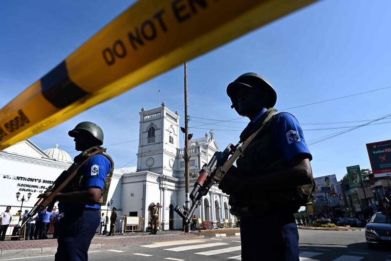 Security personnel stand guard outside St. Anthony's Shrine in Colombo a day after the church was hit in a series of bomb blasts targeting churches and luxury hotels in Sri Lanka. AFP