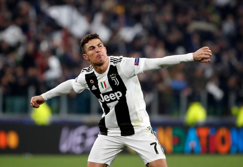 Juventus' Cristiano Ronaldo celebrates at the end of the Champions League round of 16, 2nd leg, soccer match between Juventus and Atletico Madrid at the Allianz stadium in Turin, Italy, Tuesday, March 12, 2019. Ronaldo scored the three goals in Juventus 3-0 win.(AP Photo/Antonio Calanni)