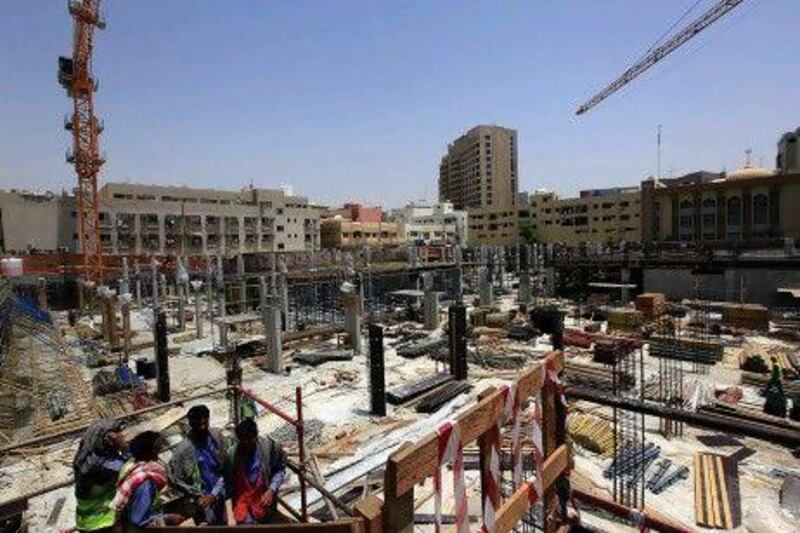 Souq Al Fahidi is to offer textiles, cosmetics, shoes, bags and more when it opens in March of next year. / The National