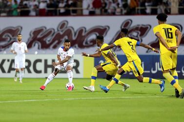 Sharjah, in white, are one of four teams from the UAE taking part in this year's AFC Champions League. Chris Whiteoak / The National