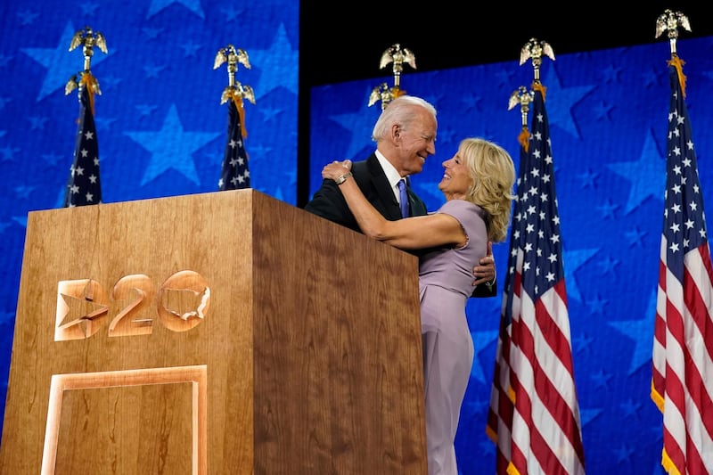 Joe Biden hugs his wife Jill Biden during the fourth day of the Democratic National Convention. AP Photo