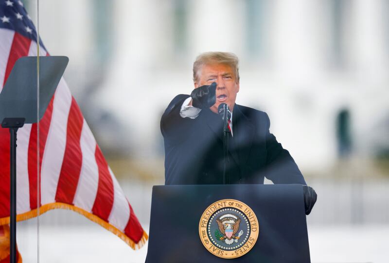 FILE PHOTO: U.S. President Donald Trump gestures as he speaks during a rally to contest the certification of the 2020 U.S. presidential election results by the U.S. Congress, in Washington, U.S, January 6, 2021. REUTERS/Jim Bourg/File Photo