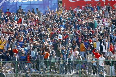 Cricket fans packed into the TU International Cricket Ground for the Nepal v Oman match. Subas Humagain for The National