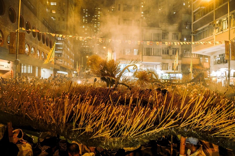 Members of fire dragon team take part during the Tai Hang Fire Dragon Dance Festival.