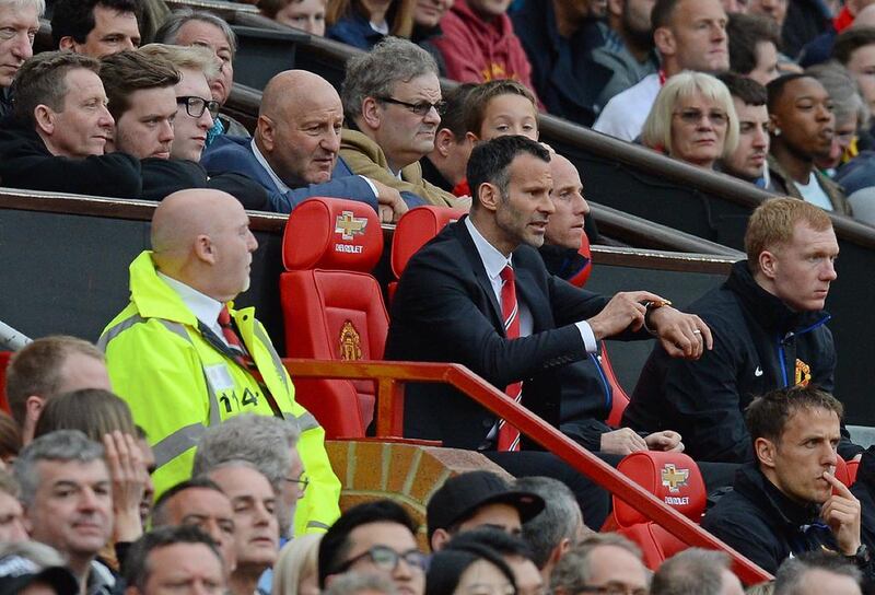 Giggs has clearly taken after Ferguson. Here he was seen pointing to his watch to the referee, a pressure tactic Ferguson used during his reign as United manager. Andrew Yates / AFP