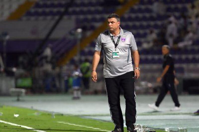 Suspensions to Mirel Radoi and Yousef Ahmad from the Al Ahli game left Al Ain coach Cosmin Olaroiu in no mood to celebrate the Pro League title after their 3-0 win over Dubai.