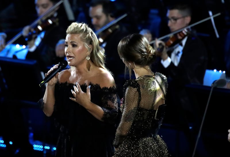 Pop singer Anastacia, left, performs with Alessandra Amoroso in the Paul VI Hall at the Vatican during the Christmas concert. AP Photo