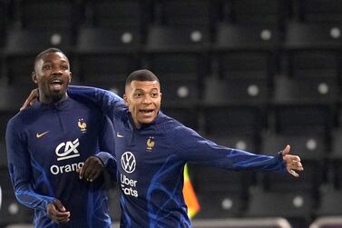 France's Kylian Mbappe, right, and Marcus Thuram, practise during a training session at the Jassim Bin Hamad stadium in Doha, Qatar, Friday, Dec.  16, 2022.  France will play against Argentina during their World Cup final soccer match on Dec.  18.  (AP Photo / Christophe Ena)