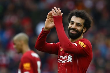 Liverpool's Mohamed Salah can help his side lift their first leage title for 30 years with a win against Everton. AFP