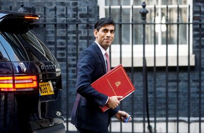 Britain's Chancellor of the Exchequer Rishi Sunak walks at Downing Street in London, Britain March 16, 2020. REUTERS/Henry Nicholls