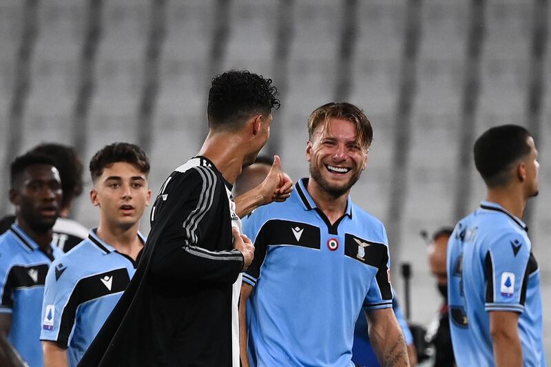 Juventus' Portuguese forward Cristiano Ronaldo congratulates Lazio's Italian forward Ciro Immobile at the end of the Serie A football match. AFP