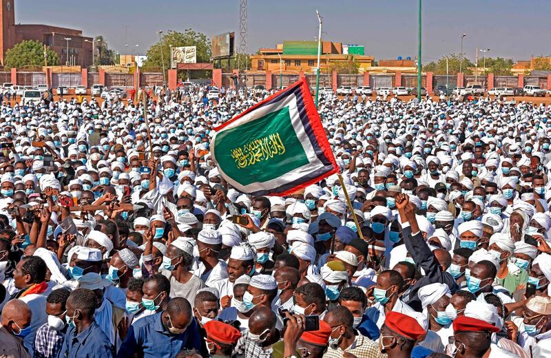 Sudanese mourners attend the funeral procession of Sudan's former prime minister and top opposition figure Sadiq al-Mahdi in Khartoum. AFP