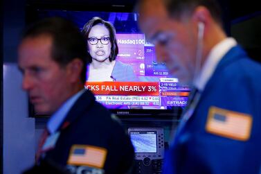 Traders working on the floor at the New York Stock Exchange (NYSE) last Wednesday, when stocks fell nearly 3 per cent. Photo: Reuters