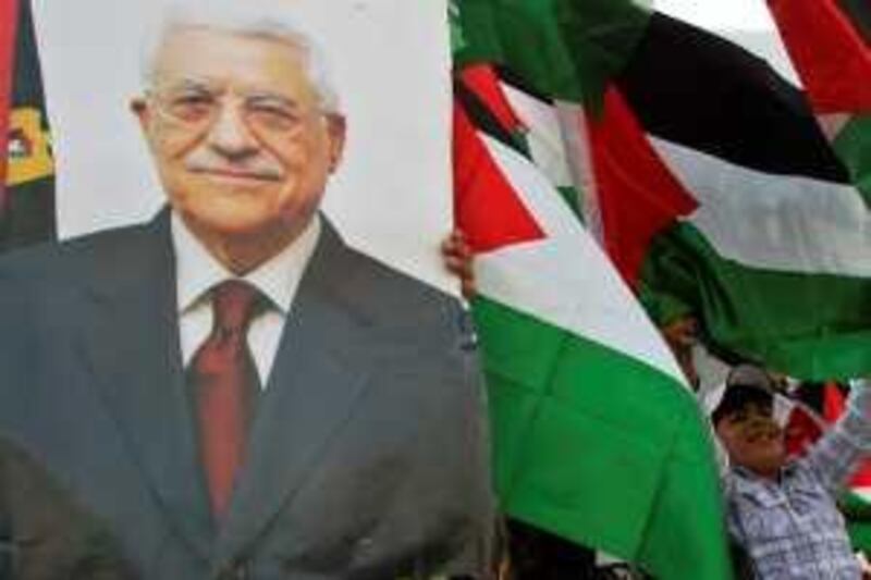 Palestinian children hold banners of Palestinian President Mahmoud Abbas during a rally in the West Bank town of Jenin, Saturday, Nov. 7, 2009. Abbas has pushed Mideast peace prospects into unknown territory by announcing Thursday he doesn't want another term and opening the way to a succession battle that could play into the hands of his rival, the militant Hamas. (AP Photo/Mohammed Ballas) *** Local Caption ***  BA102_MIDEAST_ISRAEL_PALESTINIANS.jpg