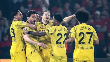 Dortmund's German defender #15 Mats Hummels (2L) celebrates with teammates after he scored his teams first goal during the UEFA Champions League semi-final second leg football match between Paris Saint-Germain (PSG) and Borussia Dortmund, at the Parc des Princes stadium in Paris on May 7, 2024.  (Photo by FRANCK FIFE  /  AFP)