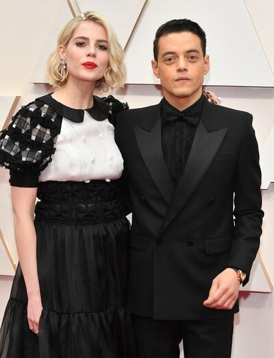 Rami Malek wore a vintage Pasha de Cartier watch to the 2020 Academy Awards, in February 2020. Seen here with partner Lucy Boynton. Courtesy Shutterstock