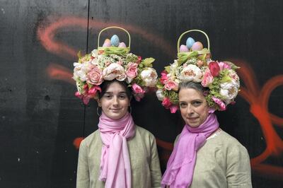 NEW YORK, NY - APRIL 01: A mother and daughter wear Easter bonnets while participating in the annual Easter Parade along 5th Ave. on April 1, 2018 in New York City. Dating back to the 1870s the Easter parade attracts thousands of people each year.  (Photo by Stephanie Keith/Getty Images)