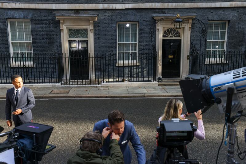 Broadcasts journalists outside No. 10, Downing Street on the day of the announcement of the new leader of the ruling Conservative Party. Bloomberg