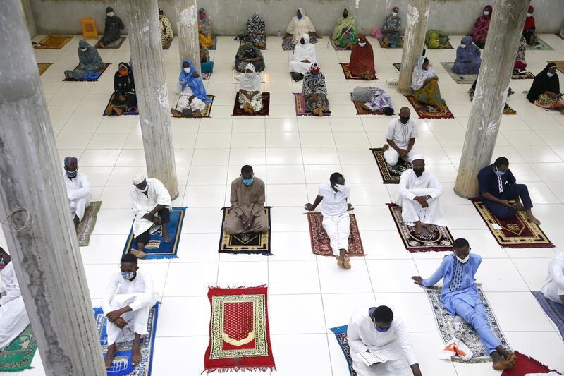 Muslims pray in a mosque during the fasting month of Ramadan, in Abidjan, Ivory Coast.  EPA