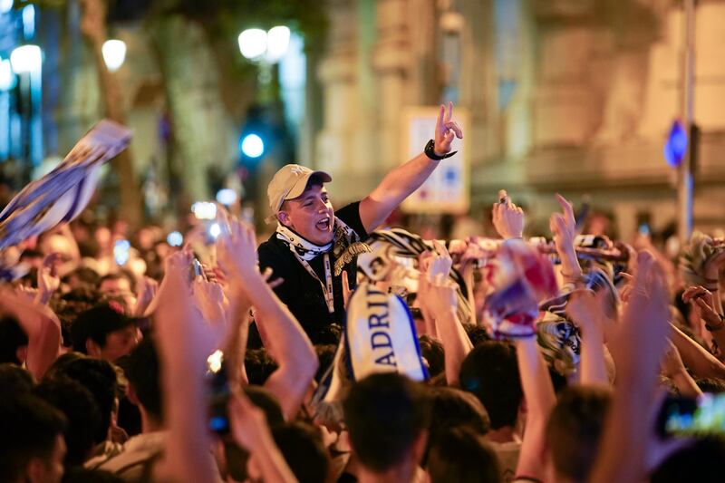 Real Madrid supporters celebrate at the end of the Champions League final. AP