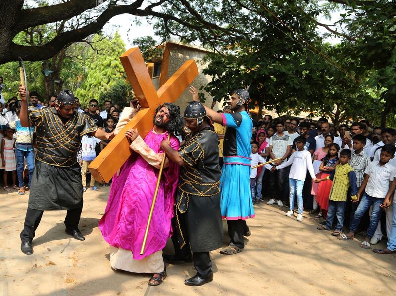 Christian devotees re-enact the crucifixion of Jesus Christ in Bangalore. Aijaz Rahi / AP Photo