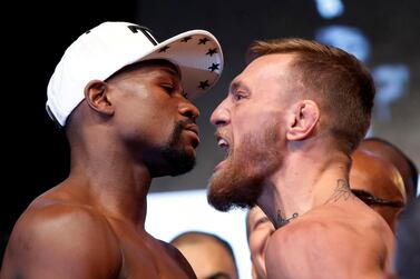 Floyd Mayweather Jr, left, won his crossover fight with Conor McGregor in 2017. Reuters 
