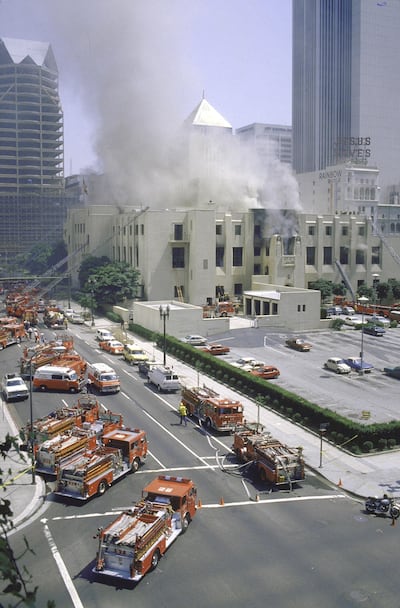Smoke engulfs Los Angeles' landmark Central Library as fire trucks fight blaze that destroyed 20% of library's 2.6 million volumes.  (Photo by Ben Martin/Getty Images)