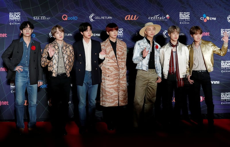 Members of South Korean boy band BTS pose on the red carpet during the annual MAMA Awards at Nagoya Dome in Nagoya, Japan, December 4, 2019. REUTERS/Kim Kyung-Hoon/File Photo