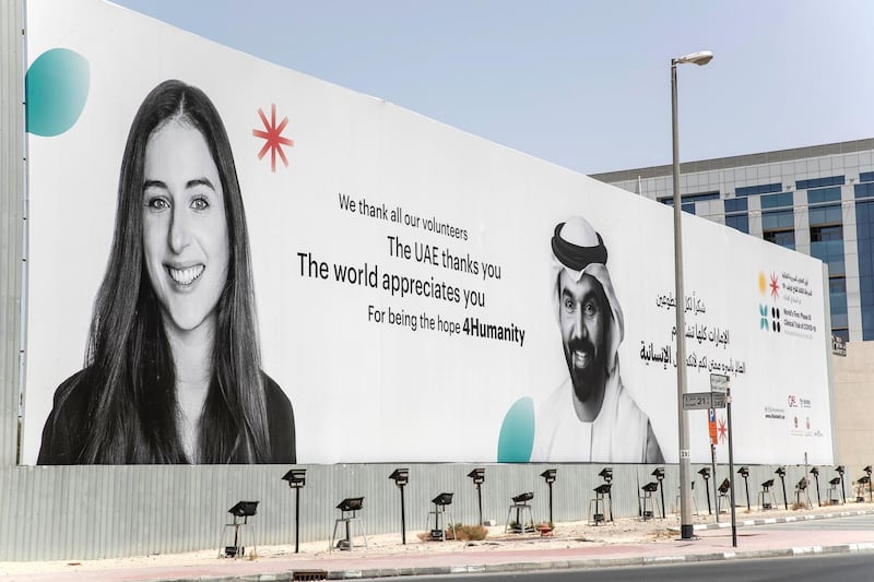 DUBAI, UNITED ARAB EMIRATES. 31 AUGUST 2020. STANDALONE. Billboard along Sheikh Zayed Road near the Business Bay Metro station in the direction abu Dhabi bound thanking the COVID Vaccine volunteers for the Phase 3 trials conducted in the UAE. (Photo: Antonie Robertson/The National) Journalist: None. Section: National.