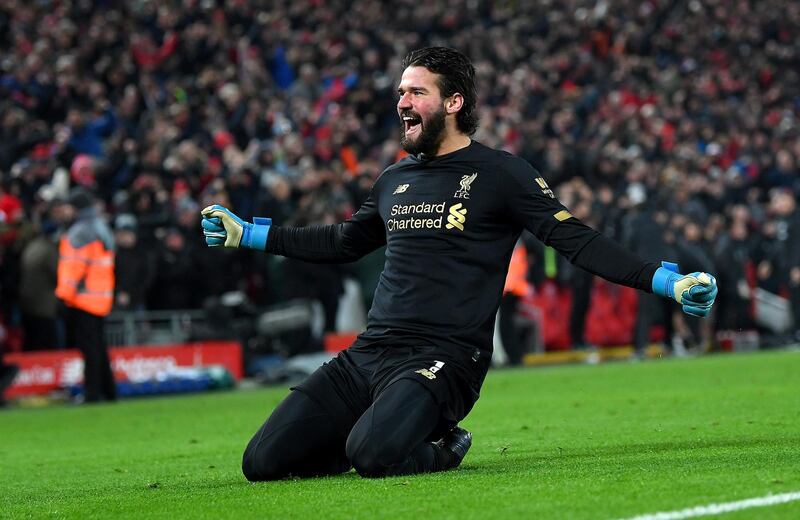 LIVERPOOL, ENGLAND - JANUARY 19: Alisson Becker of Liverpool celebrates victory after the Premier League match between Liverpool FC and Manchester United at Anfield on January 19, 2020 in Liverpool, United Kingdom. (Photo by Michael Regan/Getty Images)