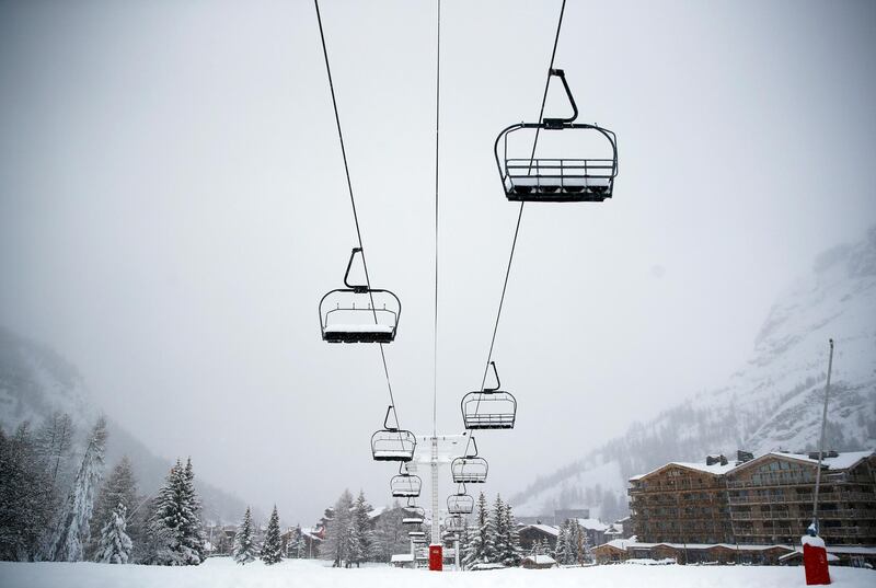 A closed chairlift is seen during a heavy snow-fall in the closed winter ski resort of Val d'Isere, France. Reuters