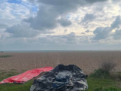 A dinghy that previously carried immigrants found on a beach in Kent. Gavin Esler