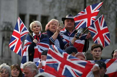 (FILES) In this file photo taken on March 29, 2019 Pro-Brexit supporters holding Union flags attend a rally in central London, organised by Leave Means Leave. Britain is set to leave the European Union at 2300 GMT on January 31, 2020, 43 months after Britons voted in the June 2016 referendum to leave the EU, ending more than four decades of economic, political and legal integration with its closest neighbours. / AFP / Daniel LEAL-OLIVAS
