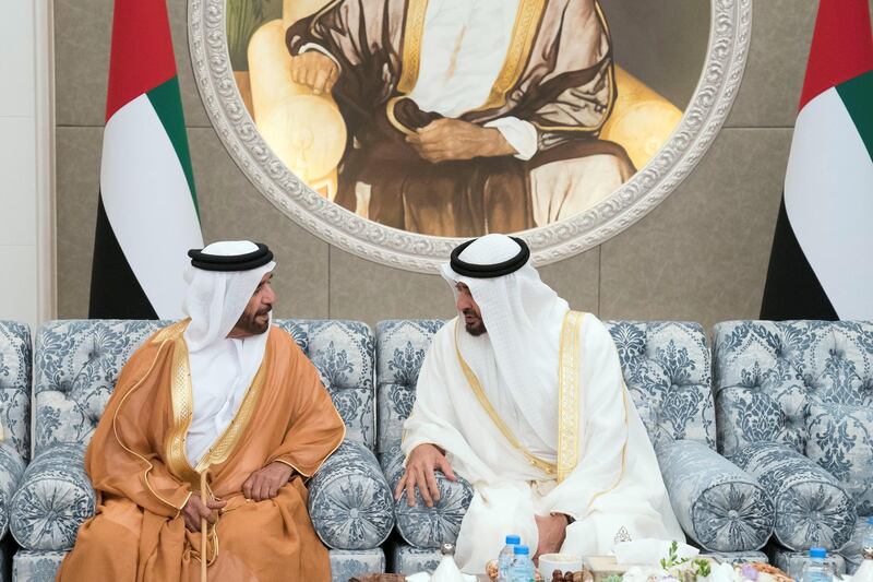 ABU DHABI, UNITED ARAB EMIRATES - June 15, 2018: HH Sheikh Mohamed bin Zayed Al Nahyan, Crown Prince of Abu Dhabi and Deputy Supreme Commander of the UAE Armed Forces (R) and HH Sheikh Saif bin Mohamed Al Nahyan (L), attend Eid Al Fitr reception, at Mushrif Palace.

( Hamad Al Kaabi / Crown Prince Court - Abu Dhabi )
—