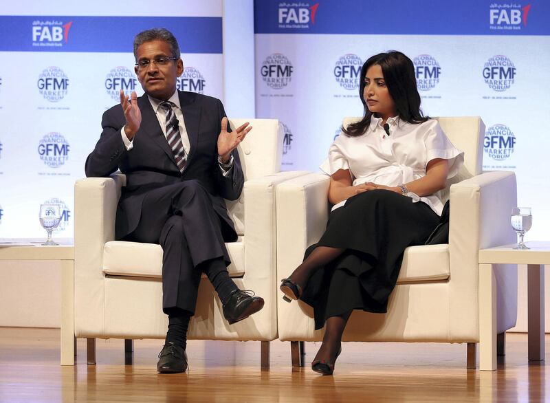 Abu Dhabi, United Arab Emirates - February 28th, 2018: Paddy Padmanathan (L), President & CEO, ACWA Power and Dr. Manar Al Moneef, President and CEO for GE Renewable Energy in the Middle East, North Africa, and Turkey on a panel discussion about alternative Energy as a necessity not luxury at the Global Financial Market Forum. Wednesday, February 28th, 2018. Emirates Palace, Abu Dhabi. Chris Whiteoak / The National