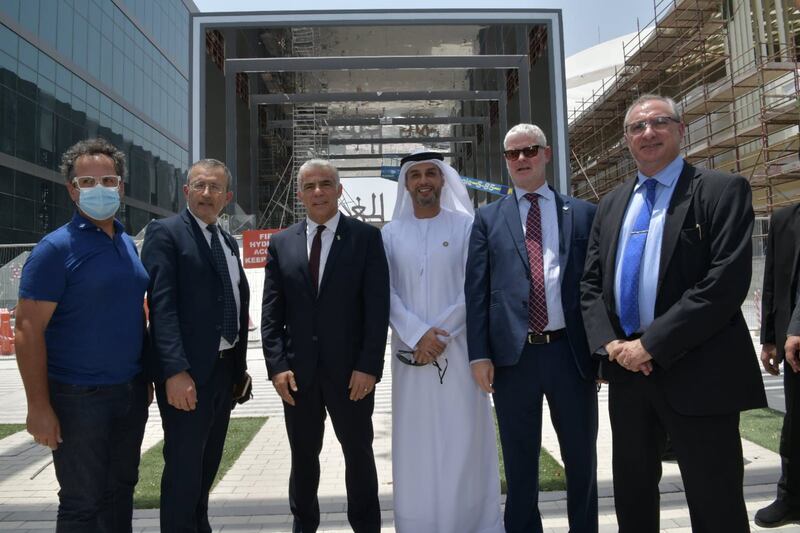 Yair Lapid pictured with Mohamed Al Khaja, the UAE's ambassador to Israel, at Israel's Expo 2020 Dubai pavilion