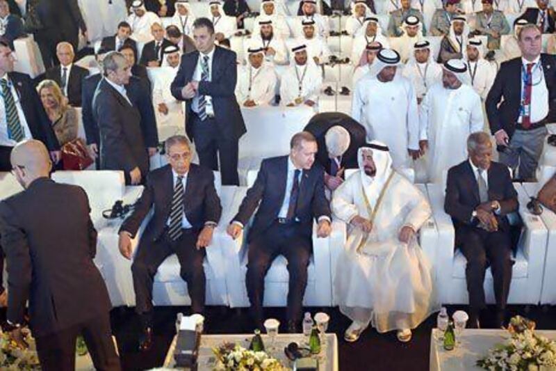 Amr Moussa, the former secretary general of the Arab League; Recep Tayyip Erdogan, the prime minister of Turkey; Dr Sheikh Sultan bin Mohammed, Ruler of Sharjah; and Kofi Annan, the former secretary general of the UN, at the Sharjah Government Communication Forum. Antonie Robertson / The National